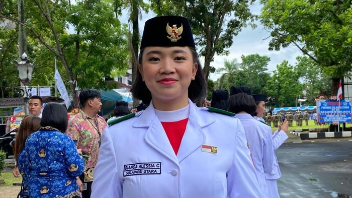 BERTUGAS - Bianca Lantang setelah bertugas di Upacara HUT ke-61 Provinsi Sulawesi Utara.