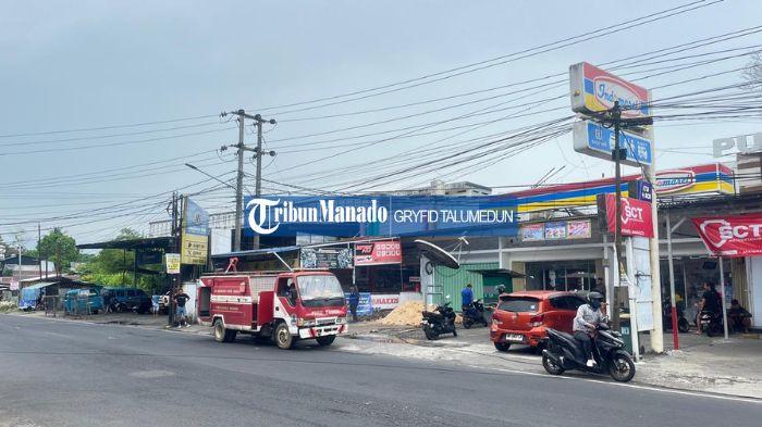 DEMO DI SULUT - Sejumlah personel kepolisian terlihat berjaga di SPBU Kairagi di Jalan Raya Manado–Bitung, Kelurahan Kairagi Satu, Kecamatan Mapanget Senin (1/9/2025).