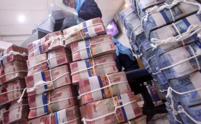 ILUSTRASI UANG - Indonesia menjadi salah satu negara yang punya utang cukup besar yakni mencapai Rp 9.138 triliun.
