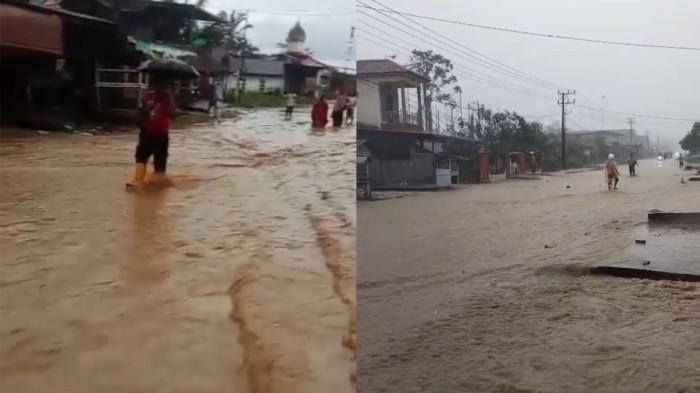 BANJIR - Hujan lebat yang mengguyur kawasan Ladang Rimba, Kecamatan Trumon Tengah, Kabupaten Aceh Selatan menyebabkan air meluap dan merendam badan Jalan Nasional lintas Tapaktuan–Subulussalam, Jum’at (5/12/2025).