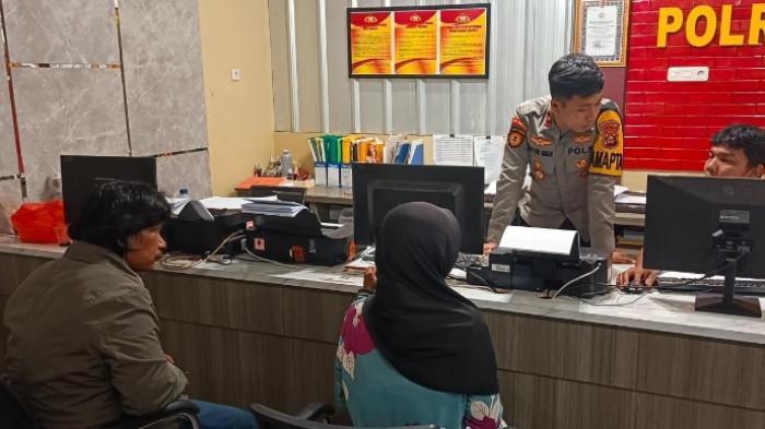 LAPOR POLISI - Orantua siswi membuat laporan ke Polrestabes Palembang terkait mata anaknya