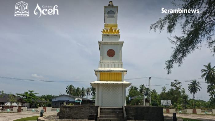 TUGU PARASAMYA - Tugu Parasamya berdiri di tengah yang diapit oleh jalan lingkar Batu Putih Meulaboh, Kecamatan Johan Pahlawan, Kabupaten Aceh Barat, Kamis (30/10/2025).