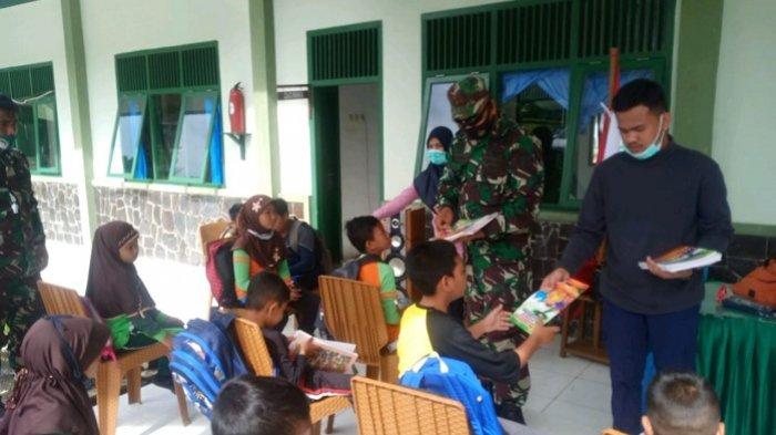 Kipan E Yonif 116/GS Bakti Sosial Bersama Anak-anak Yayasan