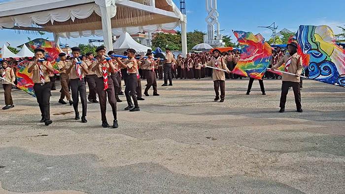 DRUMBAND SMP YPPU - Penampilan drumband SMP YPPU Sigli pada perigatan Hari Pramuka Ke-64 di halaman Gedung Pidie Convention Center (PCC) Pidie, Selasa (16/9/2025).