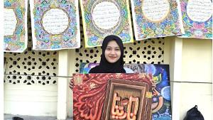 Cut-Putro-Arfiah_-Juara-Khat-Kontemporer-pada-MTQ-Aceh-2025-di-Pidie-Jaya.jpg