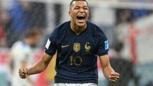 Ekpresi-tertawa-puas-striker-timnas-Perancis-Kylian-Mbappe-di-Piala-Dunia-2022.jpg