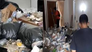 Petugas-dan-warga-melihat-kondisi-dalam-rumah-YL-50-di-Desa-Sukoharjo-Pati-yang-dipenuhi-sampah.jpg