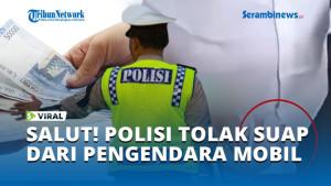 SALUT-POLISI-TOLAK-SUAP-DARI-PENGENDARA-MOBIL.jpg