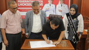 Wali-Kota-Lhokseumawe-Sayuti-Abubakar-SH-MH-bersama-Rektor-Universitas-Al-Muslim.jpg