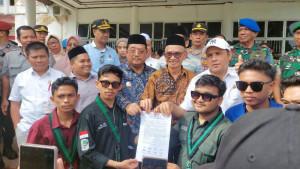 tuntutan-di-singkil-diteken.jpg