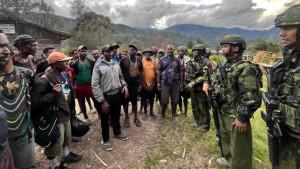 warga-Papua-rebutan-lokasi-Pos-TNI.jpg