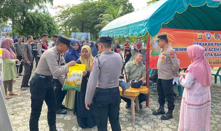 Ditbinmas-Polda-Aceh-Salurkan-15-Ton-Beras-Murah-untuk-Masyarakat.jpg