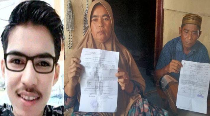 Fauziah-ibu-kandung-Imam-Masykur-25-memperlihatkan-surat-laporan-polisi.jpg