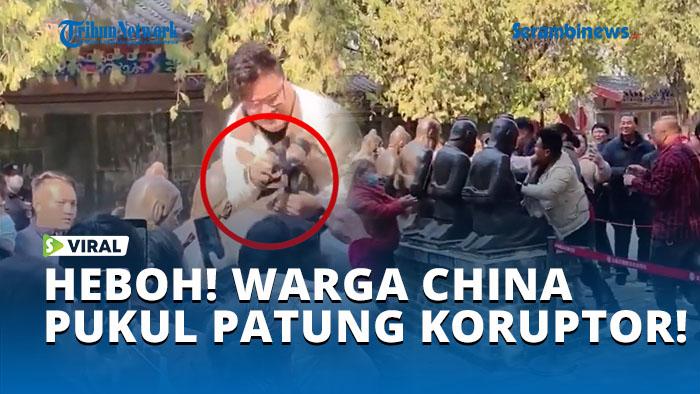HEBOH-WARGA-CHINA-PUKUL-PATUNG-KORUPTOR.jpg