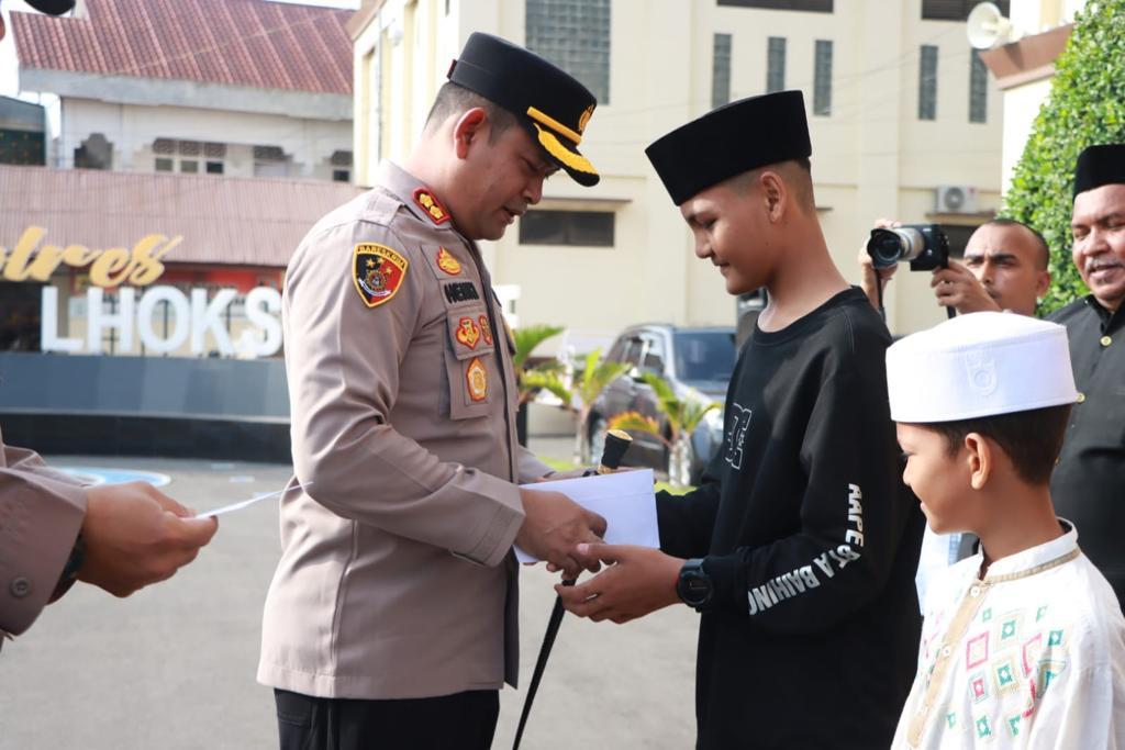 Kapolres-Lhokseumawe-Beri-Santunan-Yatim.jpg