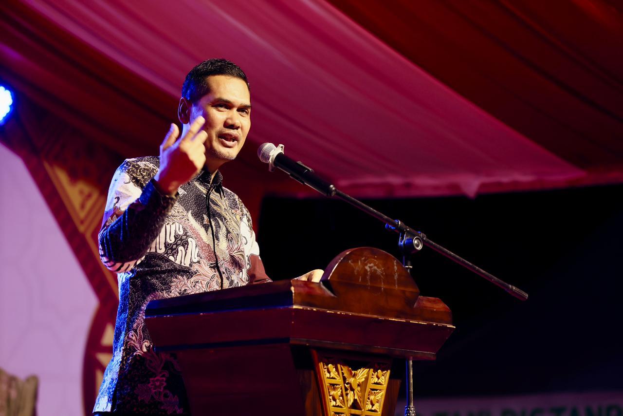 M-Nasir-saat-membacakan-sambutan-Gubernur-Aceh.jpg