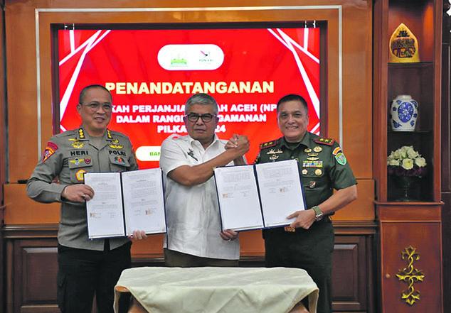 Pangdam-IM-dan-Pj-Gubernur-Teken-Hibah-Pengamanan-Pilkada.jpg