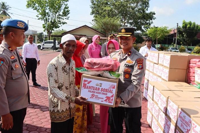 Polres-Aceh-Timur-menggelar-aksi-sosial-dengan-menyalurkan-200-paket-sembako.jpg