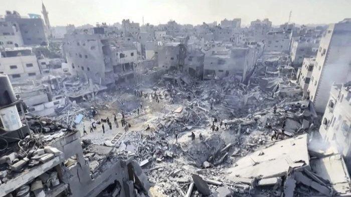 bekas-ledakan-bom-dari-serangan-udara-Israel-di-Beit-Lahia-Gaza-Utara.jpg