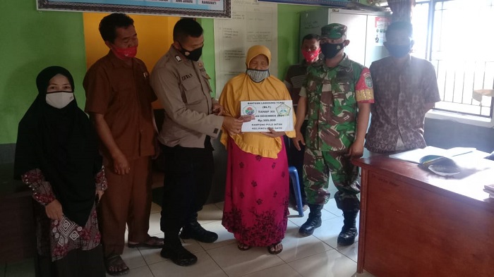 Jaga Protkes, TNI/Polri Kawal Pendistribusian BLT Dana Desa di Pintu Rime Gayo