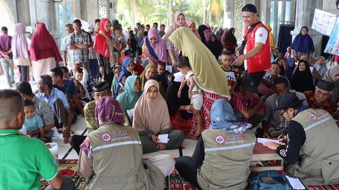 layanan-kesehatan-gratis-dan-penyaluran-bantuan-bagi-warga-terdampak-banjir-di-Kabupaten-Bireuen.jpg