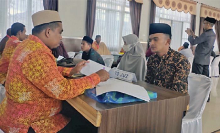 peserta-mtq-ke-35-tingkat-provinsi-aceh-sedang-mengikuti-verifikasi-fa.jpg