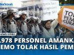 1978-Personel-Amankan-Demo-Tolak-Hasil-Pemilu-di-Kantor-Bawaslu.jpg