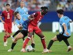 Aksi-Ismael-Kone-laga-Copa-America-2024-antara-Timnas-Kanada-dan-Timnas-Uruguay.jpg