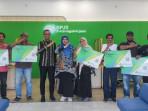Aulia-Rahman-didampingi-Kepala-Cabang-BPJS-Ketenagakerjaan-Banda-Aceh.jpg