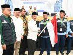 Calon-jamaah-haji-Aceh-Besar-mengikuti-acara-pelepasan-di-Aula-Jeddah-Asrama-Haji.jpg