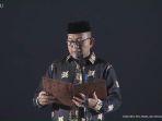 Drs-H-Azhari-MSi-memimpin-doa-pada-pembukaan-PON.jpg