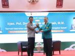 Irjen-Pol-Marzuki-Ali-Basyah-bersama-Rektor-USK-Prof-Marwan.jpg