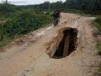 Jembatan-Tinanggam-Jebol.jpg