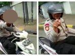 Oknum-polisi-tampak-menunjuk-nunjuk-dan-mengacungkan-jari-tengah.jpg