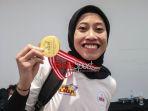Pemain-voli-Jakarta-BIN-Megawati-Hangestri-Pertiwi-menunjukkan-medali-Proliga-2024.jpg