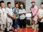 Pemkab Abdya Salurkan Bantuan untuk Keluarga Korban Meninggal di Malaysia 