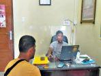 Penyidik-Polres-Bireuen-memeriksa-Tar-alias-Midi-sebaga.jpg
