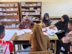 Petugas-Dispersip-Pidie-melakukan-mapping-di-Dinas-Perpustakaan-dan-Dispersip-Pidie.jpg