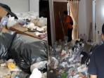 Petugas-dan-warga-melihat-kondisi-dalam-rumah-YL-50-di-Desa-Sukoharjo-Pati-yang-dipenuhi-sampah.jpg