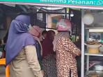 Petugas-saat-berpatroli-ke-salah-satu-warung-nasi-di-kawasan-Kecamatan-Meuraxa.jpg