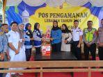 Pj-Bupati-serahkan-bingkisan-untuk-petugas-pos-mudik.jpg