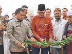 Plt-Dirut-Bank-Aceh-Bob-Rinaldi-bersama-Pj-Bupati-Aceh-Besar.jpg