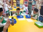 Proses-pembagian-MBG-di-Taman-Kanak-kanak-TK-Rauzatul-Khaira.jpg