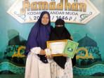 Raishah-Syakirah-Siswa-MTs-Mahad-Shafwatul-Quran-Wakili-Khafilah-Banda-Aceh-di-MTQ-Aceh-2025.jpg