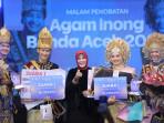 Saqti-Aprilian-dan-Cut-Riska-Adilla-Muly-sebagai-Agam-Inong-Banda-Aceh-2025.jpg