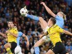 Striker-Manchester-City-Erling-Haaland-mencetak-gol-ke-gawang-Borussia-Dortmund.jpg