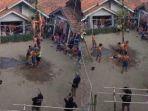 Tangkap-layar-video-viral-peserta-panjat-pinang-tewas-di-Brebes.jpg