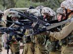 Tentara-Israel-berkumpul-di-sisi-Israel-di-sepanjang-wilayah-perbatasan-Gaza.jpg