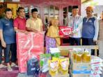 Wabup-Abdya-Zaman-Akli-serahkan-bantuan-masa-panik.jpg