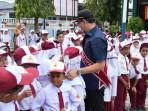 Wakil-Ketua-DPRK-Banda-Aceh-Jadi-Pembina-Upacara-di-SDN-66-Ilie-Tekankan-Tiga-Kunci-Sukses.jpg